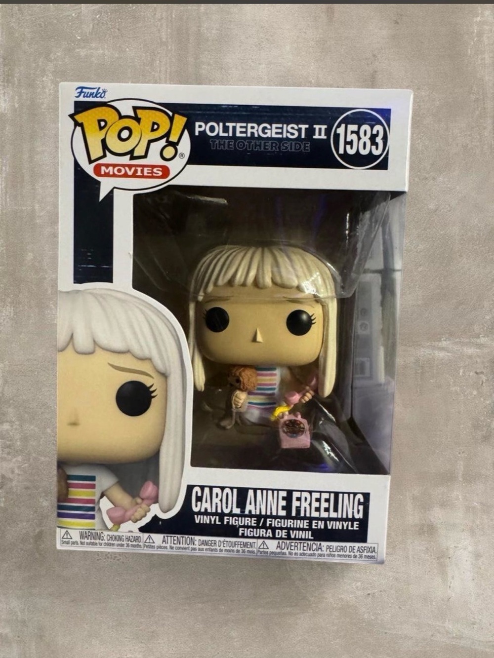 Funko Pop! Movies Carol Anne Freeling Vinyl Figure – White, Black, Pink